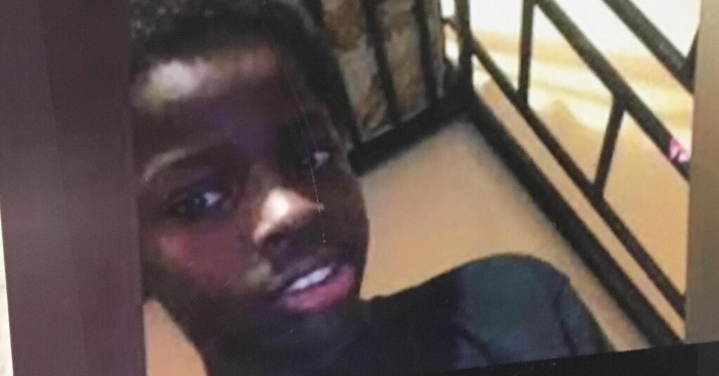 A close up selfie of a young Black boy.