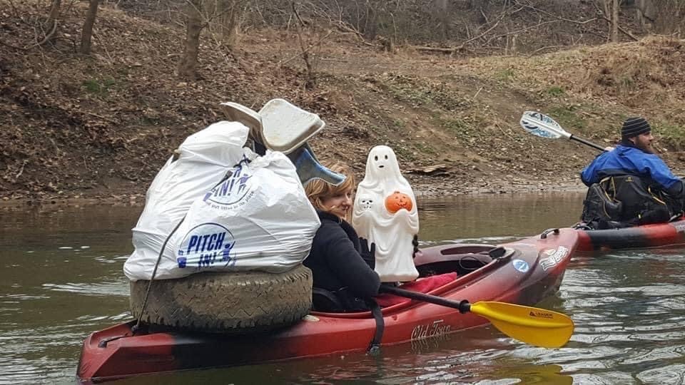 Michelle Martin during a typical day on the river, collecting trash.