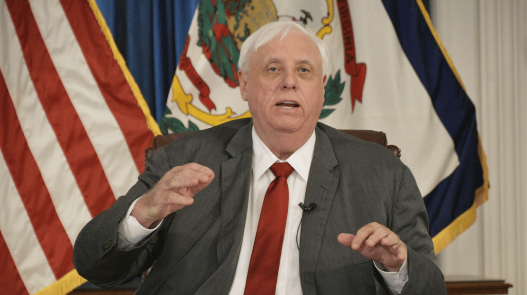 A picture of Governor Jim Justice wearing a grey suit and red tie.