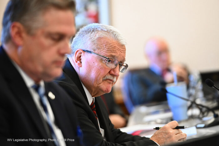 Sen. David Stover, R-Wyoming, behind Sen. Mike Azinger, R-Wood, at the January 24, 2023 meeting of the Senate Education Committee.