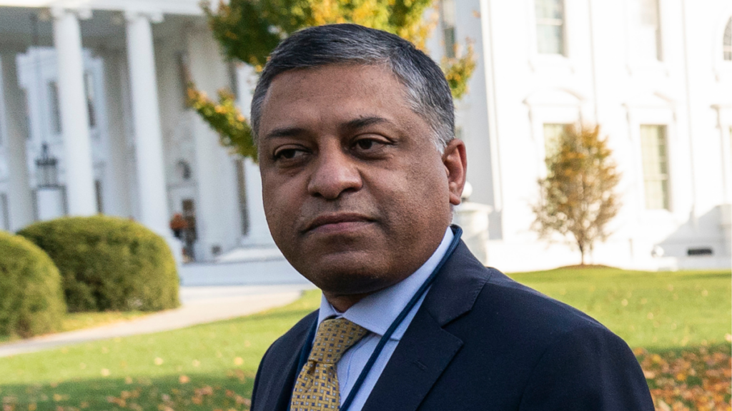A photo of Rahul Gupta standing outside the White House.