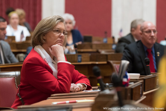 Delegate Amy Summers, R-Taylor, sits at her desk in the West Virginia House of Delegates.