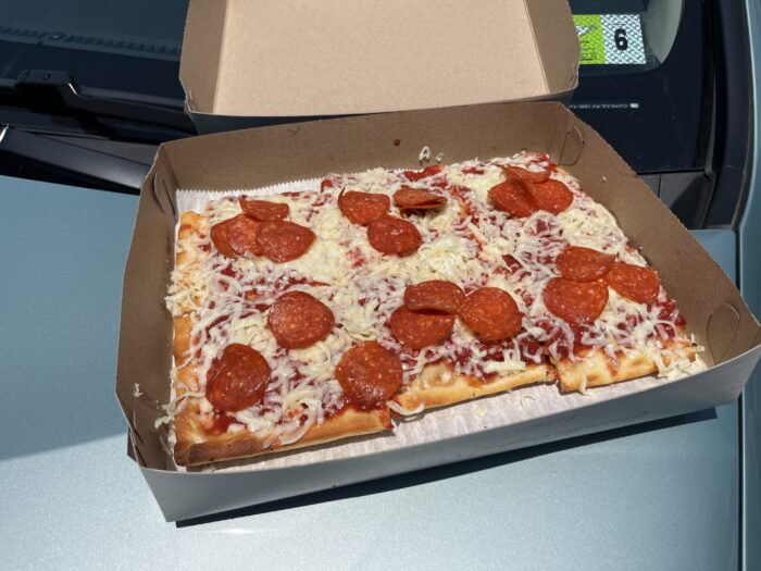 Fresh pepperoni pizza is seen in a pizza box.