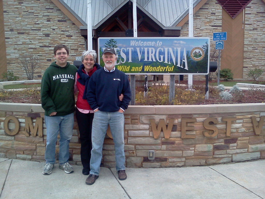 Trish Hatfield with her husband Jim and their son Ben. Trish’s question “Where does the phrase, ‘West by God Virginia’ come from?” won our latest Wild, Wondering West Virginia poll.