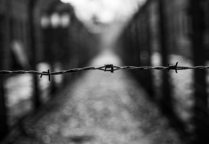 A single strand or barbed wire between trains.