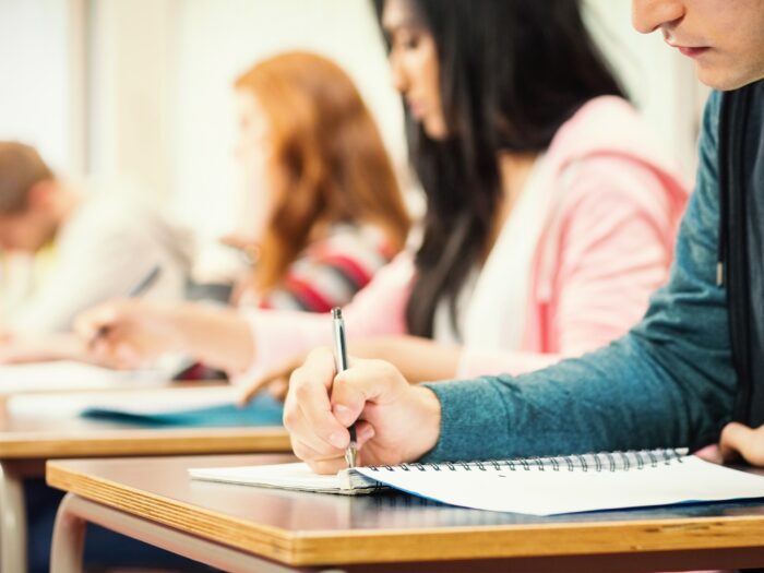 Students at desks taking a standardized test