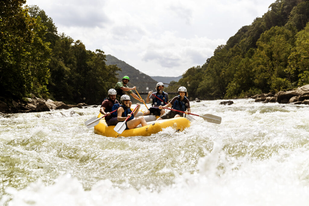 Group of paddlers in a whitewater raft.