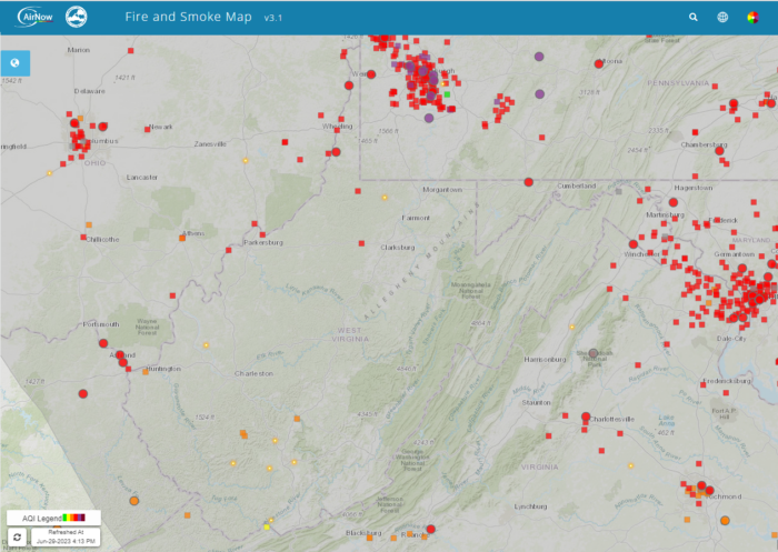 A map primarily showing West Virginia also includes Columbus, Ohio Pittsburgh, Pennsylvania and Washington D.C. Across the map can be seen red dots indicating air monitors, with a high concentration around the cities and few in West Virginia.