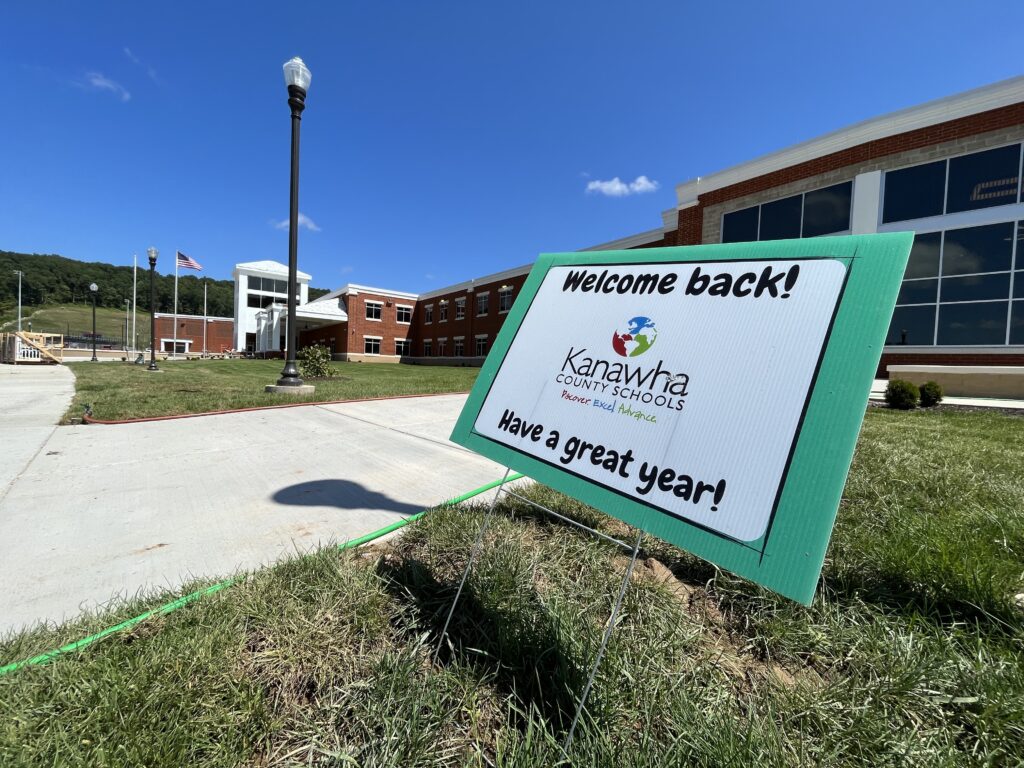 A sign welcomes students back for another year of school.