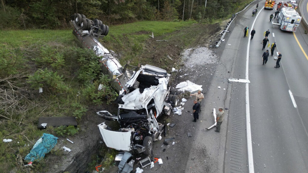 Upended tractor trailer on highway
