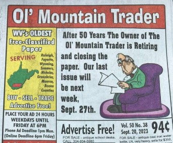 A photo of a paper publication front page. On the front page there is a cartoon of a man sitting on his couch reading a paper. The front page reads "After 50 Years the Owner of The Ol' Mountain Trader is Retiring and closing the paper. Our last issue will be next week Sept. 27th." On the left side there is a bright yellow column saying "WV's OLDEST Free-Classified Paper.