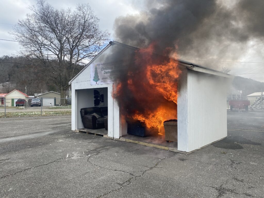 A blaze shooting out a garage door.