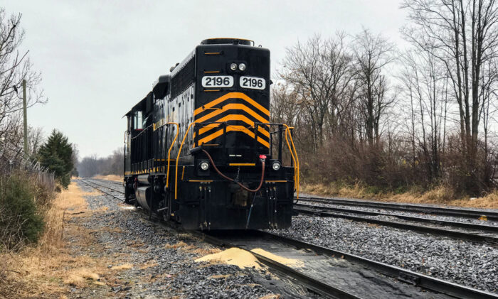 A locomotive is seen parked on tracks.