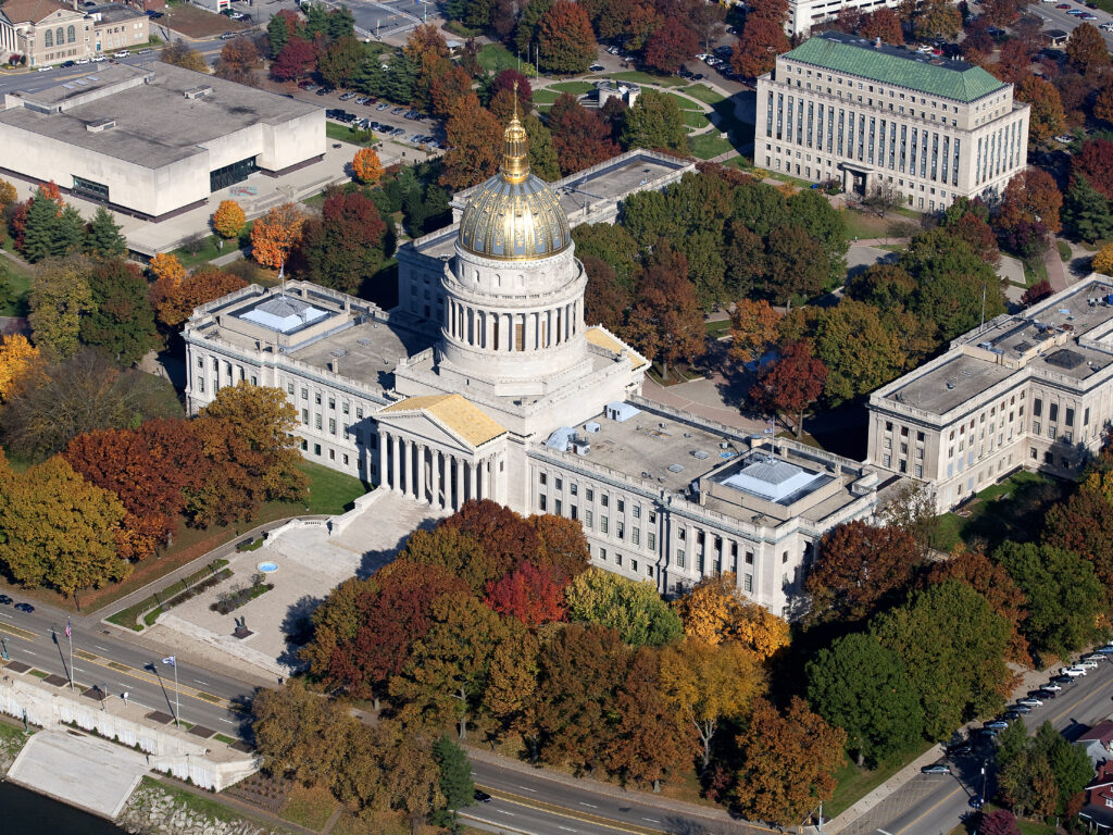 An aerial view of the West Virginia Capitol Building. Below can be seen the iconic gold leaf dome.