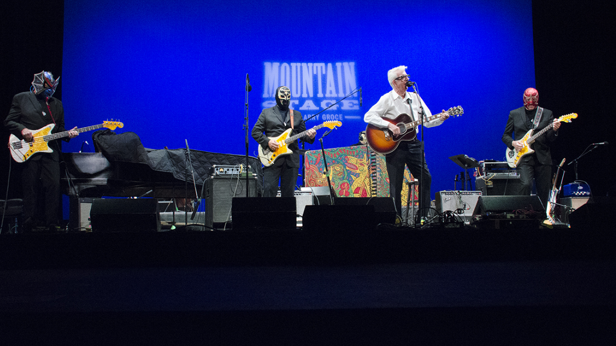 LISTEN: Nick Lowe & Los Straitjackets Have The Mountain Stage Song Of The Week