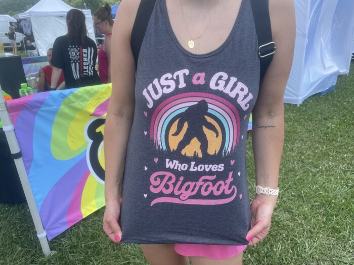 woman in a t-shirt about bigfoot. The t-shirt reads, "Just a girl who loves Bigfoot."