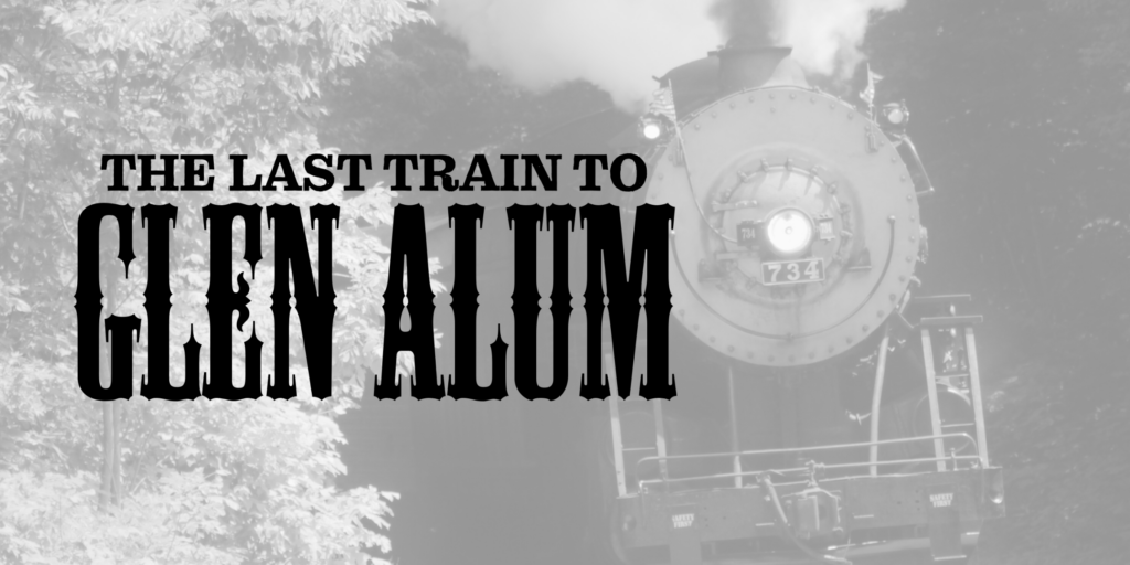 A train with smoke coming out of it. Over the image is the text The Last Train to Glen Alum.