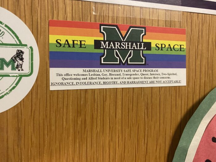 Sticker on a door that describers room as a "safe place."