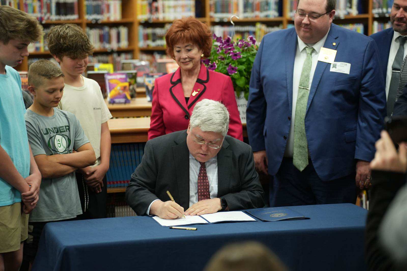 Morrisey Signs School Smartphone Ban, National Motto Bills Into Law