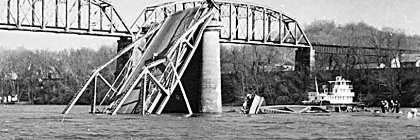 A half-collapsed bridge in the water