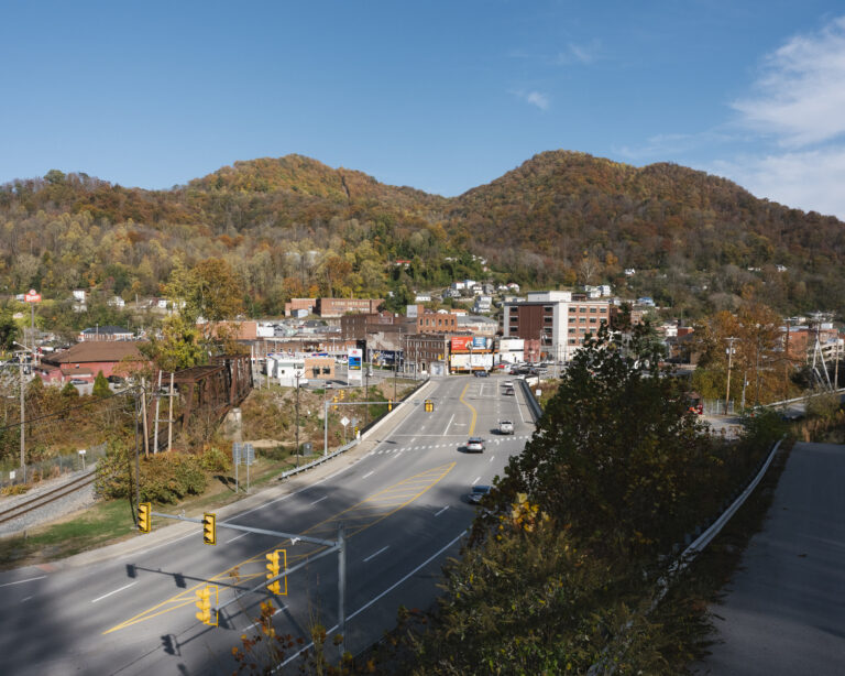 A high up wide shot of a rural town on a clear day.