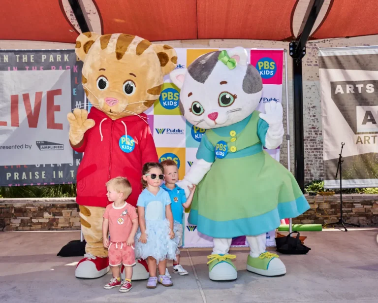 Daniel Tiger and Katerina Kittycat with three children.