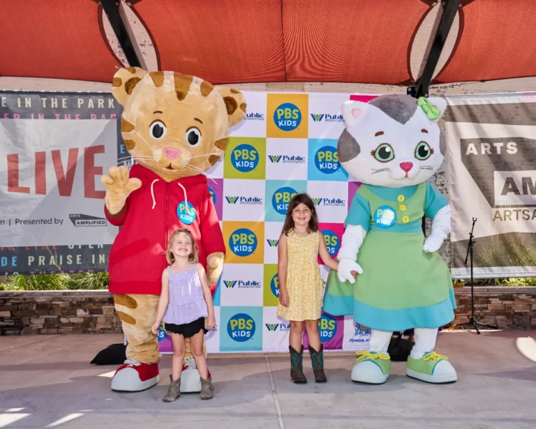 Daniel Tiger and Katerina Kittycat and two small girls.