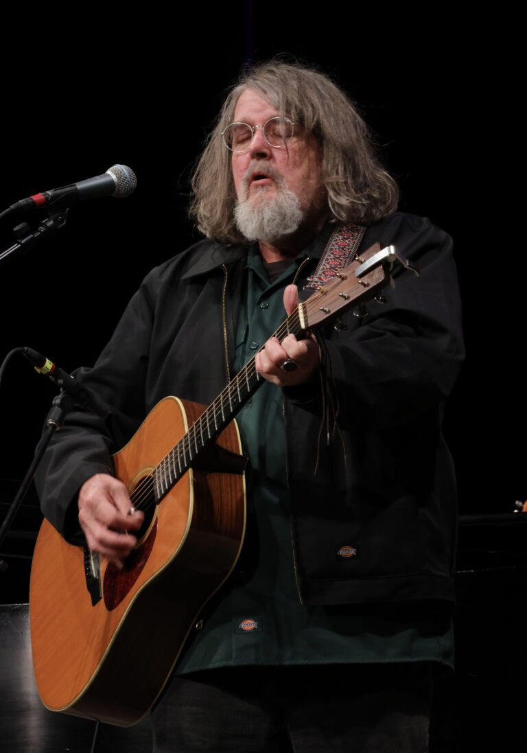 man playing guitar