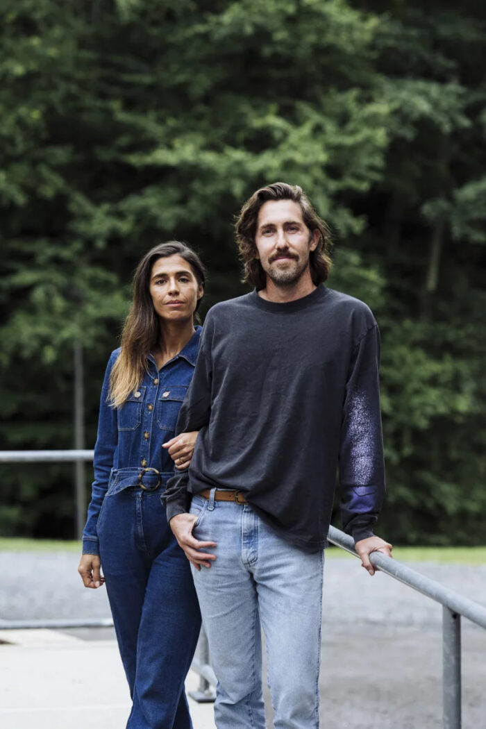 Portrait of a young man and woman looking at camera