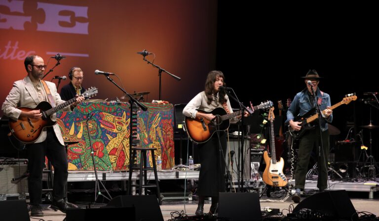 band plays music on stage