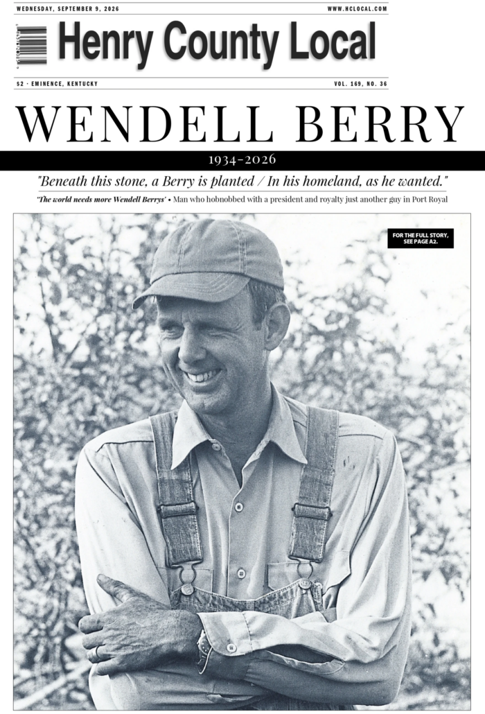 A black-and-white cover newspaper of a newspaper titled, "Henry County Local." There is a photo of a man wearing overalls with his arms crossed. The name above him reads, "Wendell Berry."